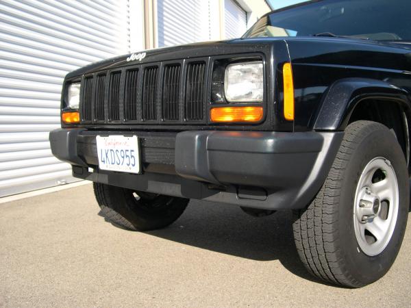 Black textured plastic pieces were a light gray the day prior until the the Mother's plastic conditioner was applied.