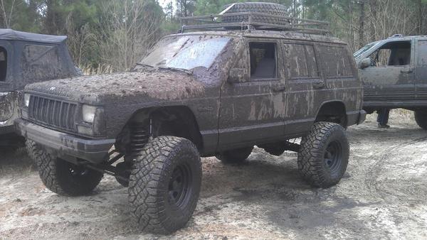 Notice the puddle under the driver's door... the mud was inside up to my knees just minutes before this.