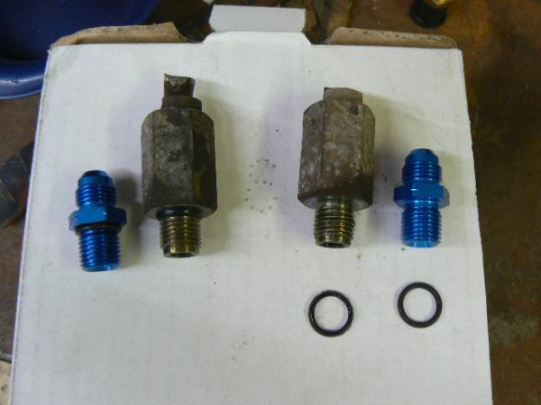 OEM trans cooler connectors and the -6an hose adapters new Oring on right