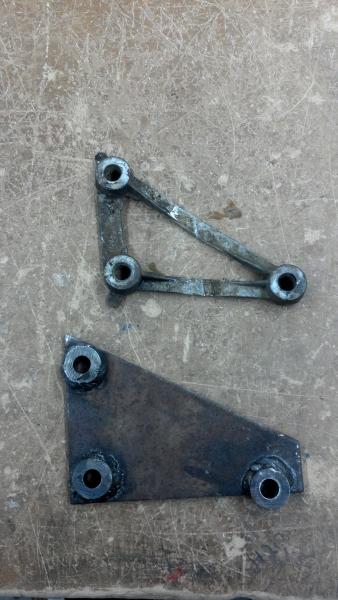 Stock steering brace and fabbed one
