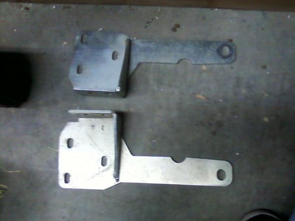 Tow hook brackets